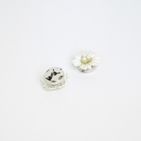The Iris Button Cover ( Pair ) button covers by Nashira, shown close up (image 6 of 6)