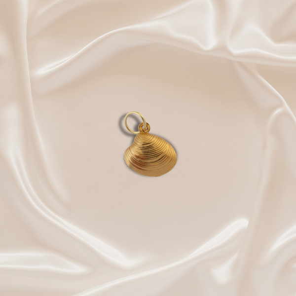The Golden Shell Charm