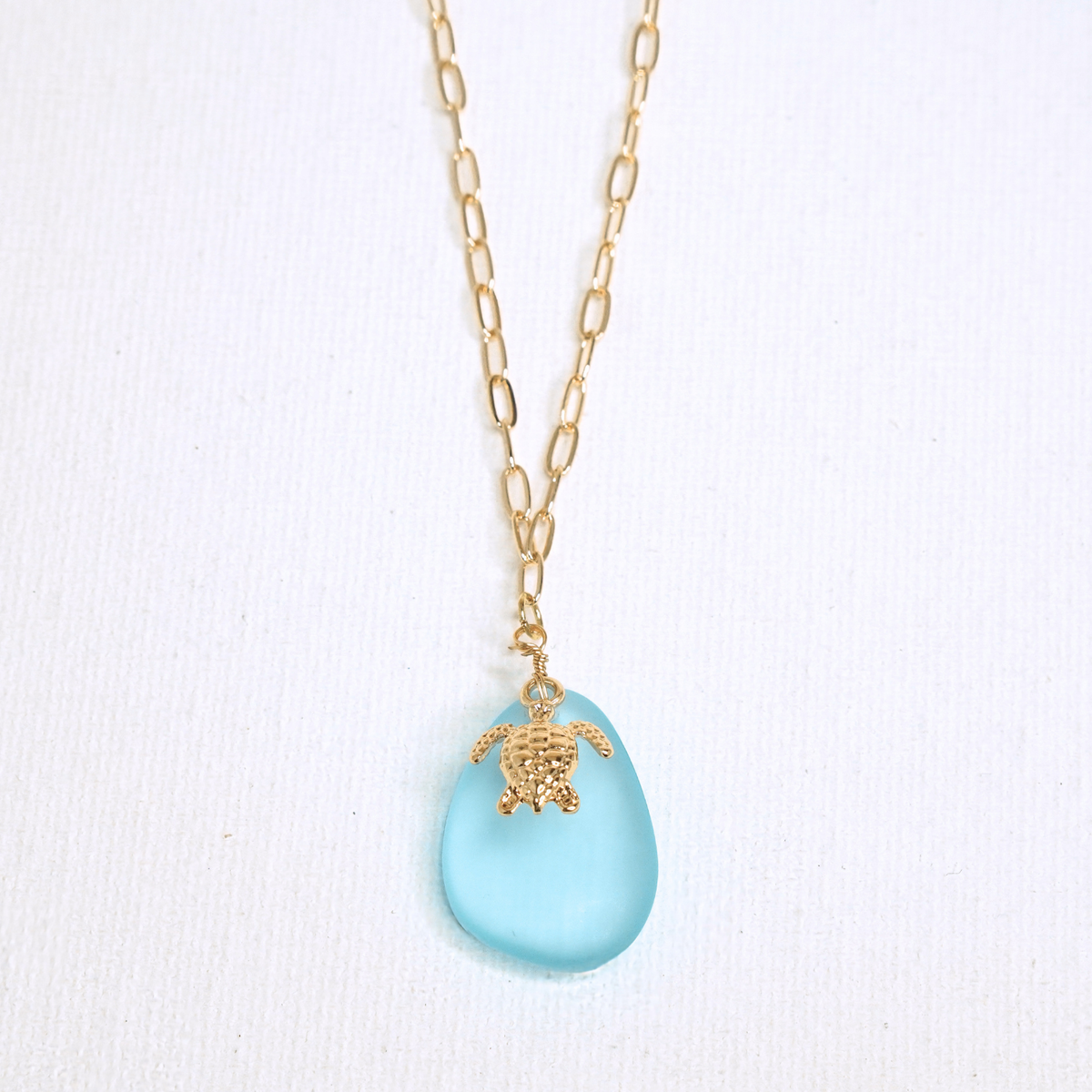 The Amalfi Turtle necklace by Nashira, shown close up