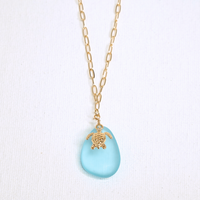 The Amalfi Turtle necklace by Nashira, shown close up