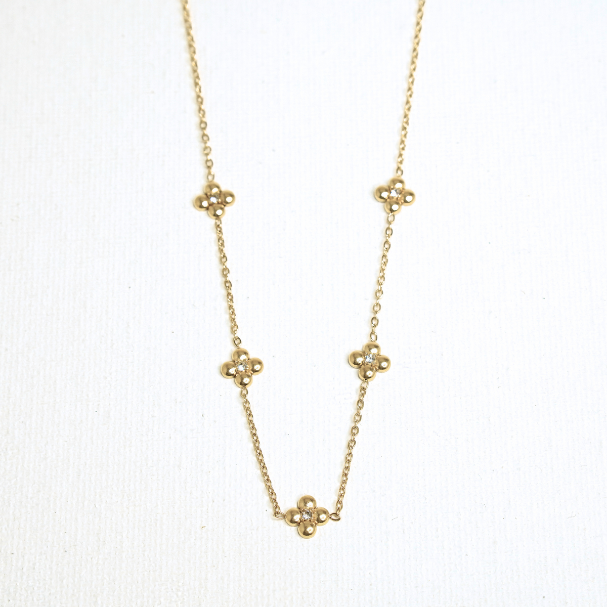 Golden Blossom Necklace necklace by Nashira, shown close up