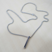 Edge Bar Pendant necklace by Nashira, shown close up