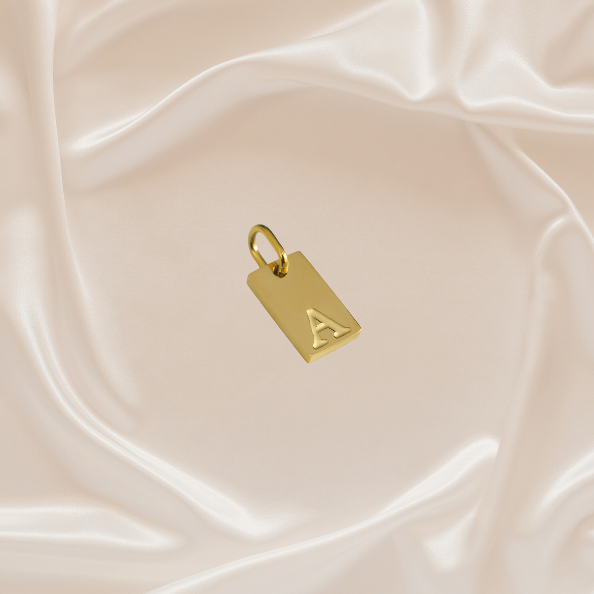 Dainty Alphabet Charm Gold - A - Stainless Steel charm by Nashira