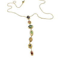 The Cosmic Gem Drop earrings by Nashira, shown close up