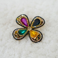 Jewel Bloom Brooch brooch by Nashira, shown close up