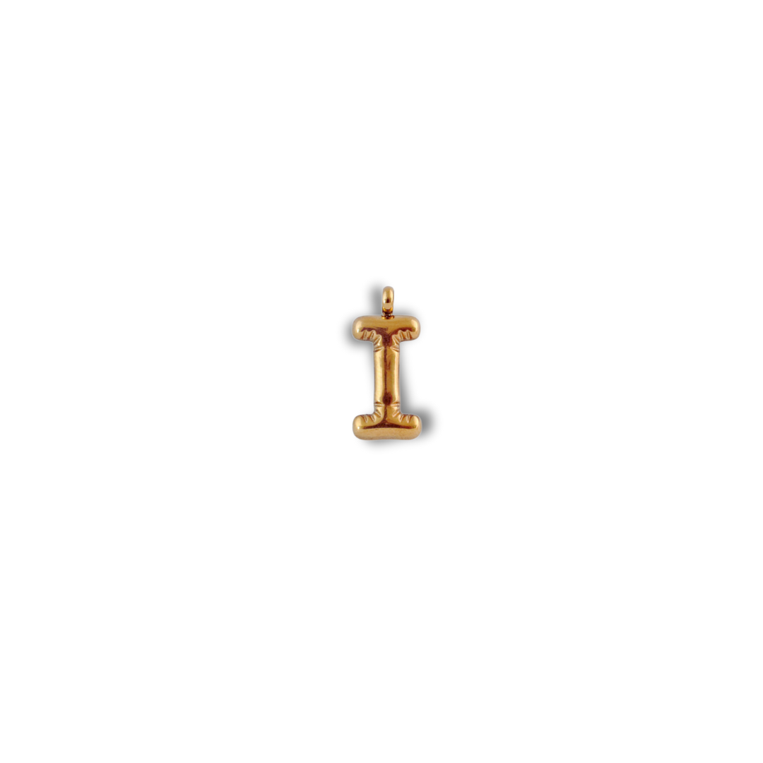 Alphabet Charm - I pendant by Nashira, shown close up