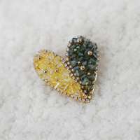 Aurora Heart Brooch brooch by Nashira, shown close up
