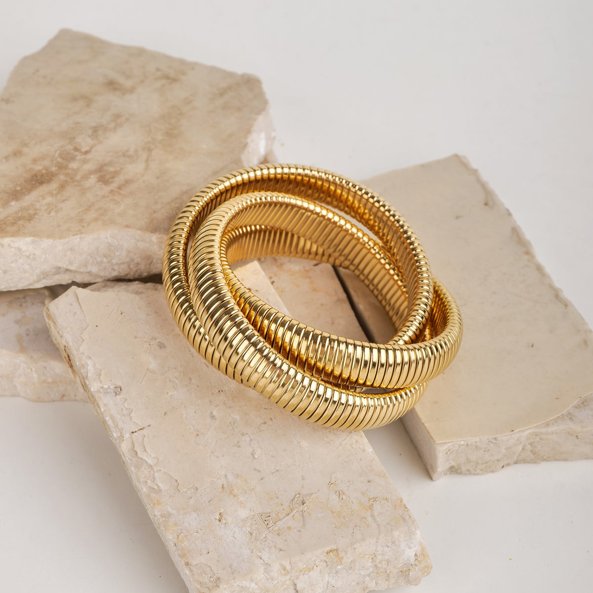 Stretchable Three Snake Bangle bracelet by Nashira, shown close up