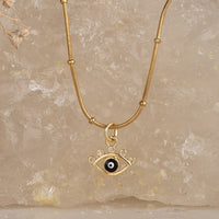Classic Evil Eye Necklace necklace by Nashira, shown close up
