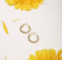 Galaxy Hoops earrings by Nashira, shown close up