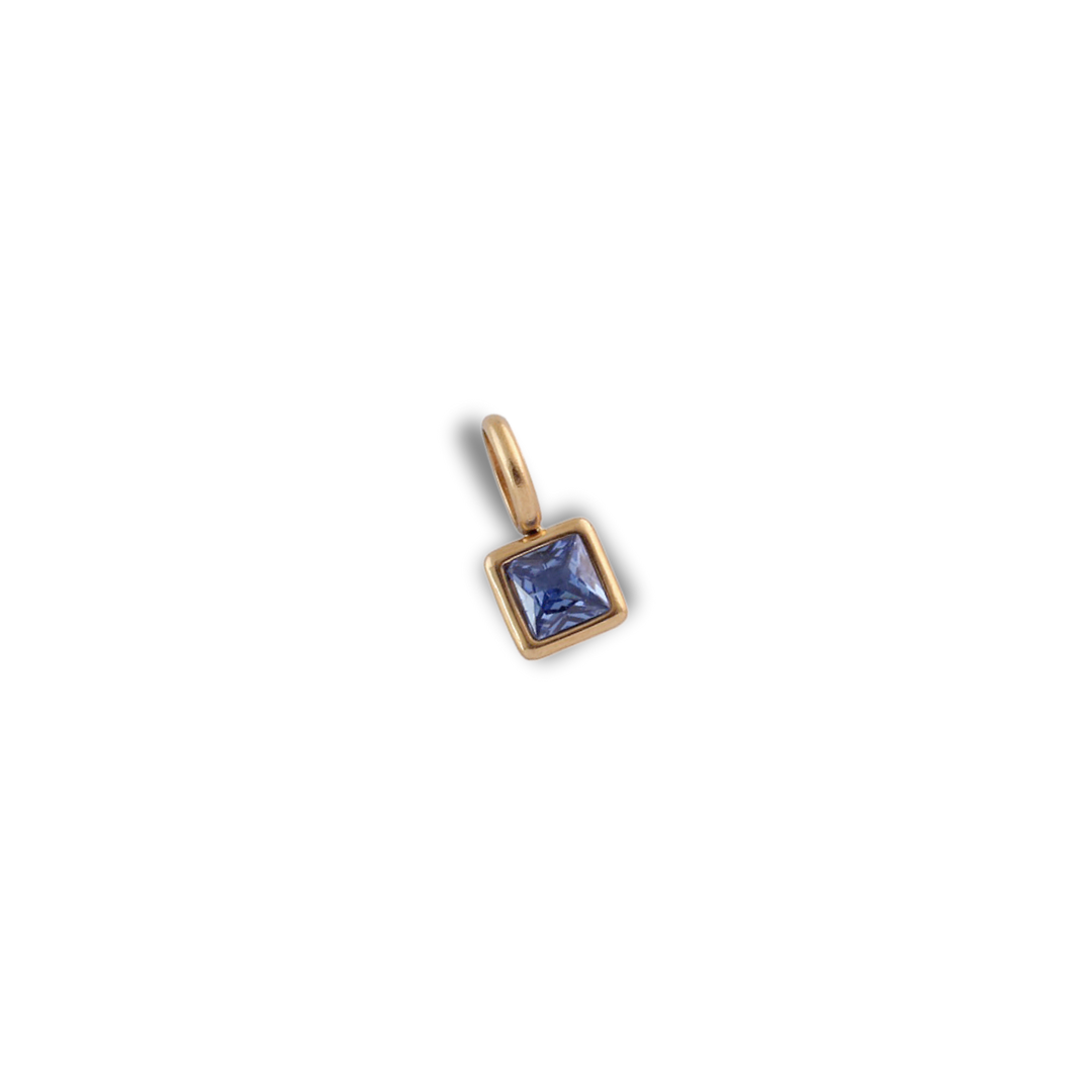 Birthstone Charm - September pendant by Nashira, shown close up