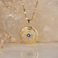 Greek Horus Evil Eye Pendant with Necklace necklace by Nashira, shown close up
