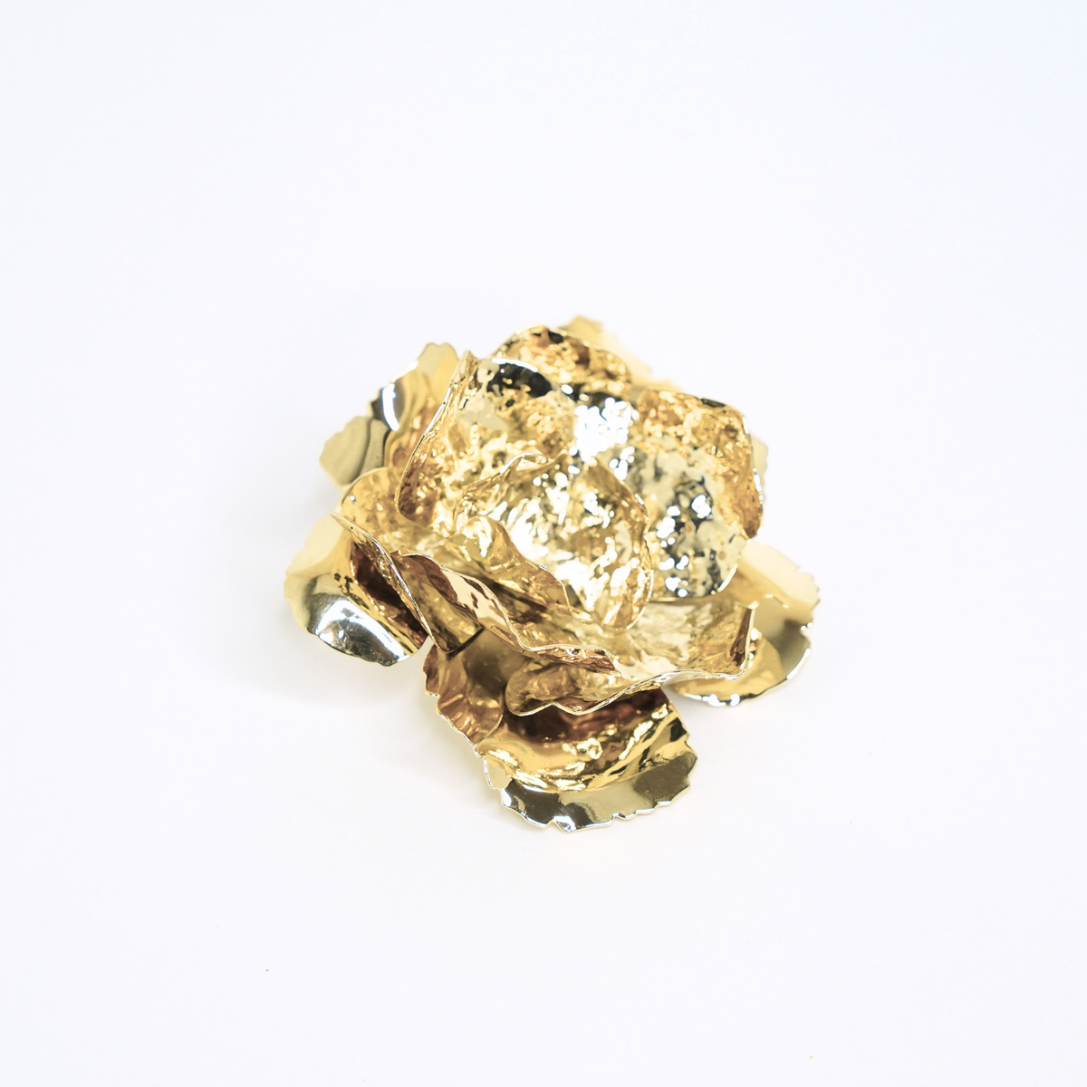 The Golden Bloom Brooch brooch by Nashira, shown close up