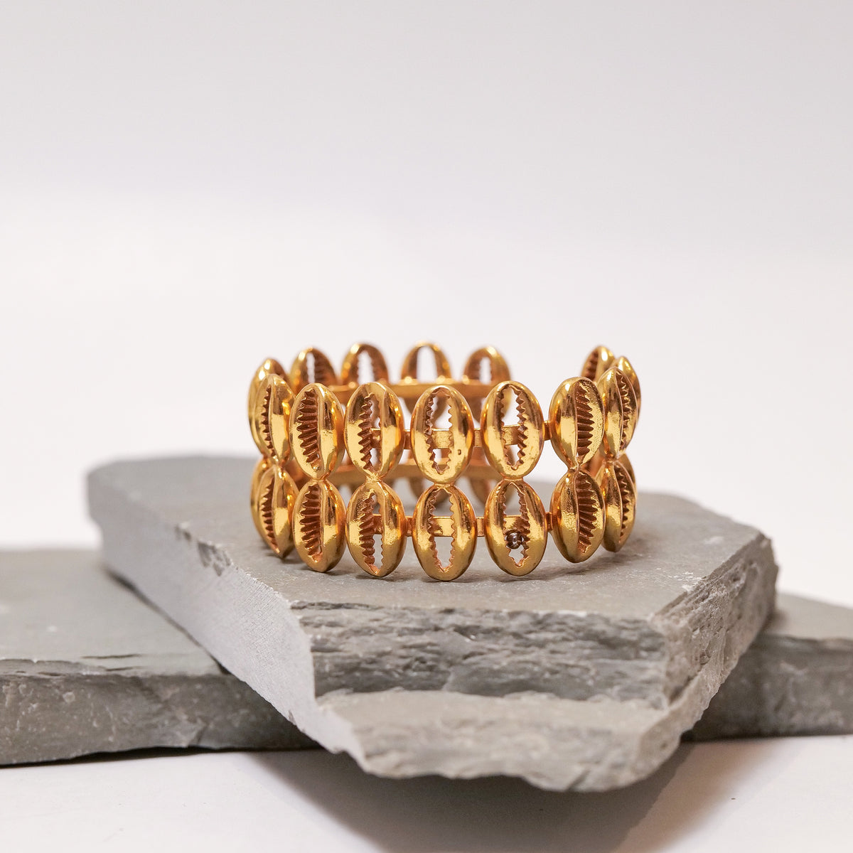 Gold Shell Bracelet bracelet by Nashira, shown close up