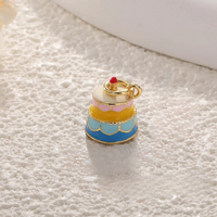 The Birthday Cake Charm charm by Nashira, shown close up