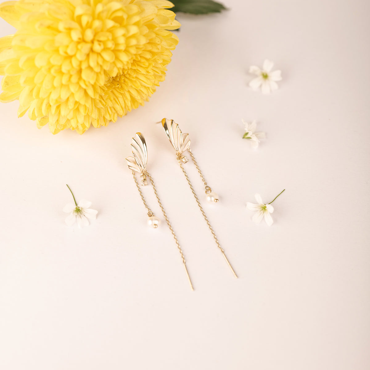 Flutter Two Way Earrings earrings by Nashira, shown close up