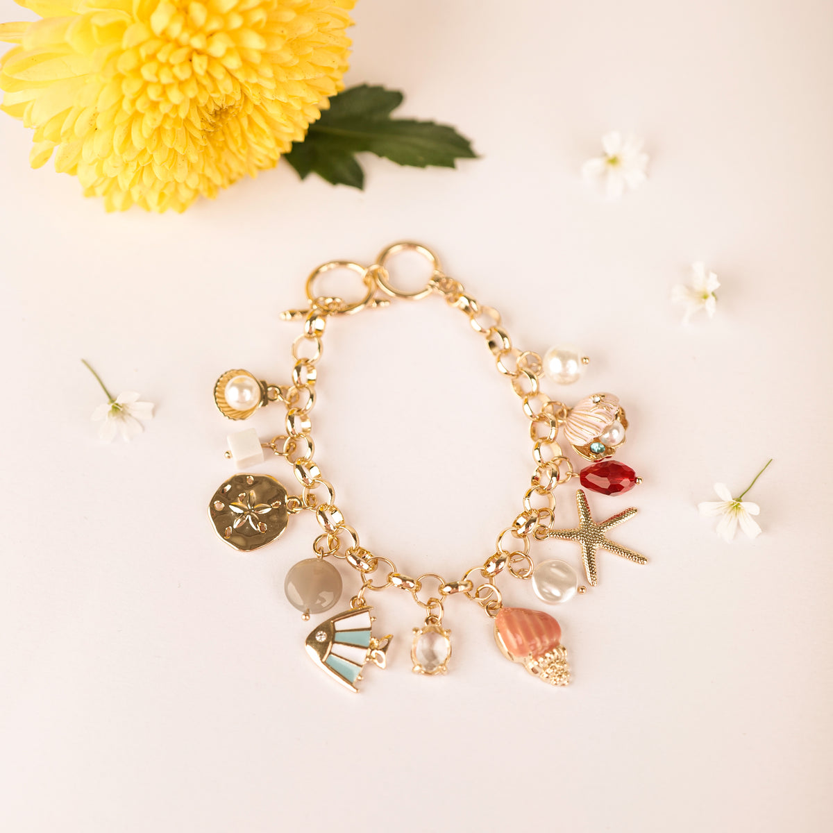 Beach Please Charm Bracelet bracelet by Nashira, shown close up