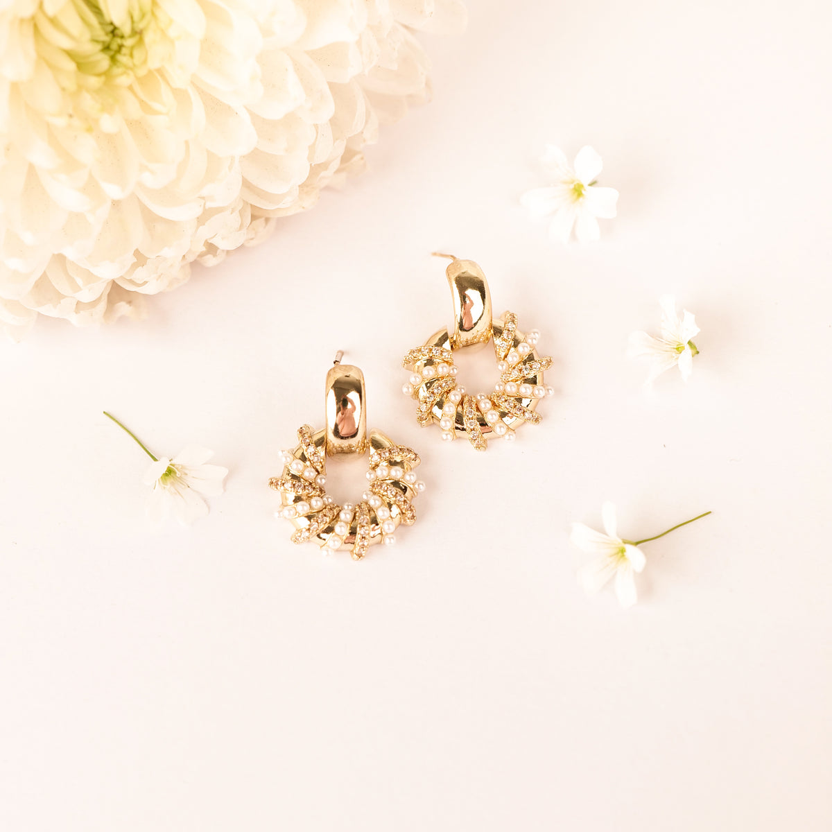 Hola Studs earrings by Nashira, shown close up