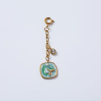 Deep Sea Dive Hanging Charm charm by Nashira, shown close up