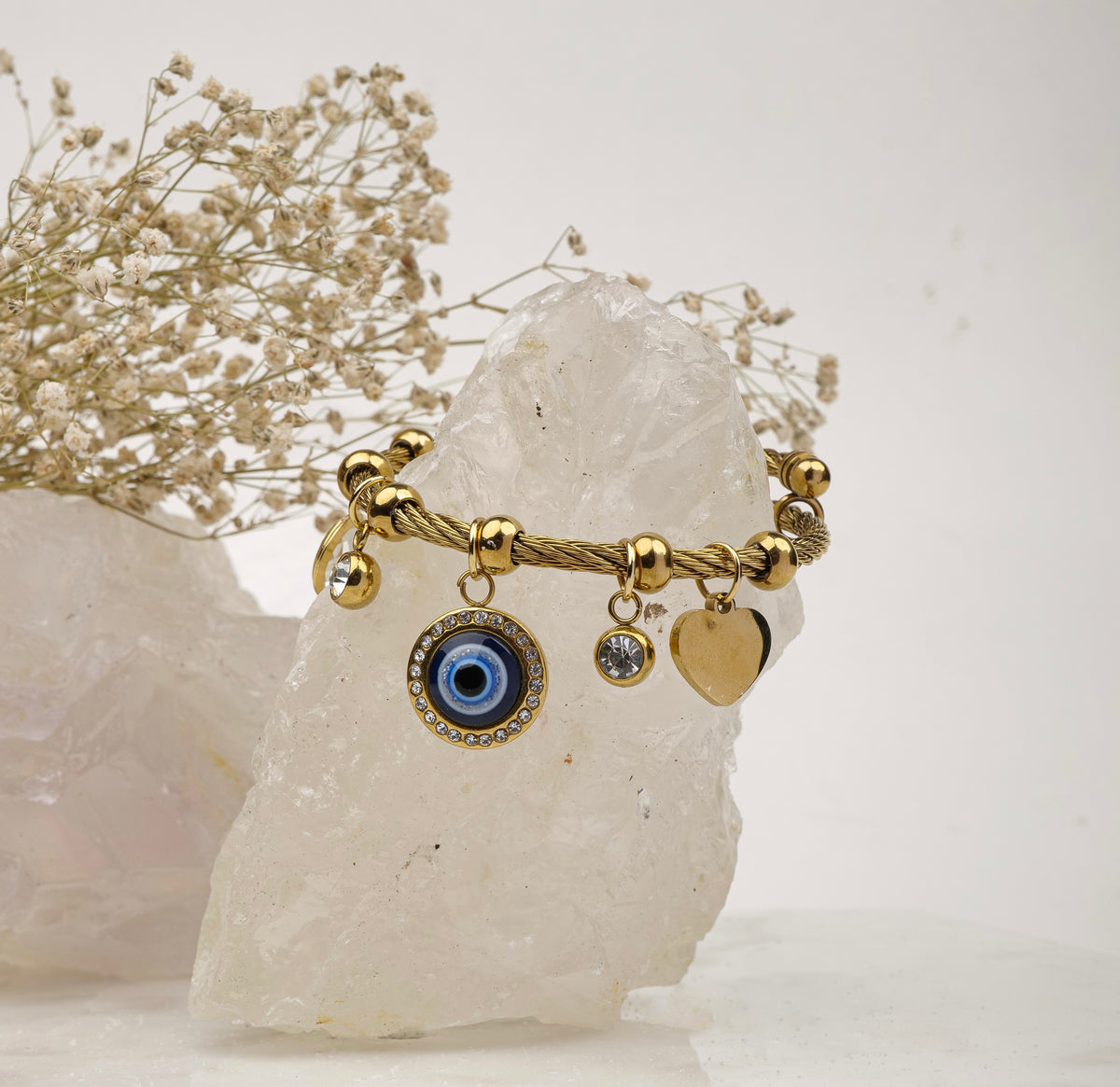 Evil Eye Charm Bracelet bracelet by Nashira, shown close up