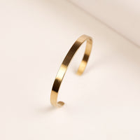 Gold Metal Cuff Bracelet for Men bracelet by Nashira, shown close up