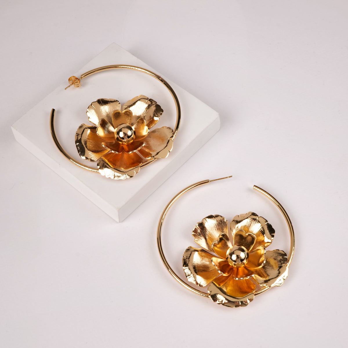 Saturday Hoops earrings by Nashira, shown close up