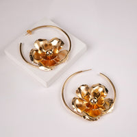 Saturday Hoops earrings by Nashira, shown close up