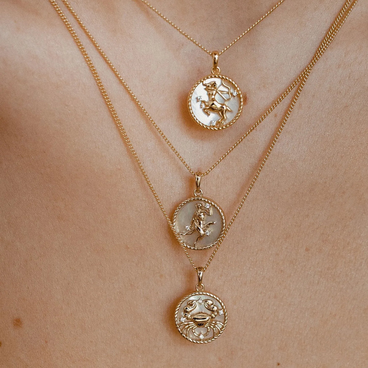Zodiac Celestial Symbol Pendant with Chain necklace by Nashira, shown close up