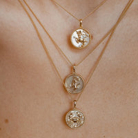 Zodiac Celestial Symbol Pendant with Chain necklace by Nashira, shown close up