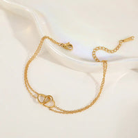 Double Heart Bracelet bracelet by Nashira, shown close up