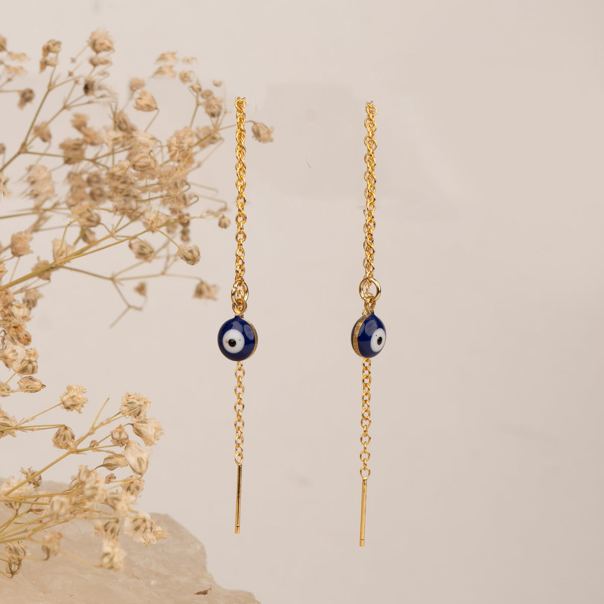 Nazar Needle and Thread necklace by Nashira, shown close up