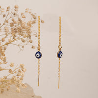 Nazar Needle and Thread necklace by Nashira, shown close up