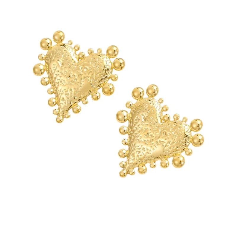 Love Bomb Studs - earrings from the Nashira collection