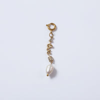 Pure Love Hanging Charm charm by Nashira, shown close up