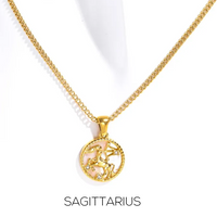 Zodiac Celestial Symbol Pendant with Chain necklace by Nashira, shown close up (image 10 of 16)