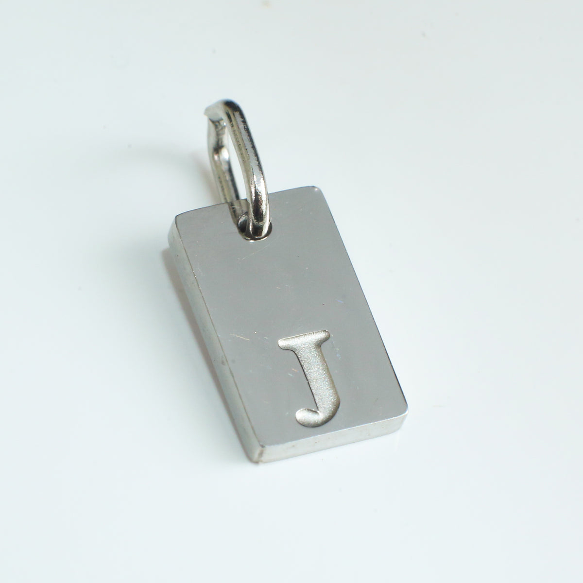Dainty Alphabet Charm Silver - J - Stainless Steel charm by Nashira