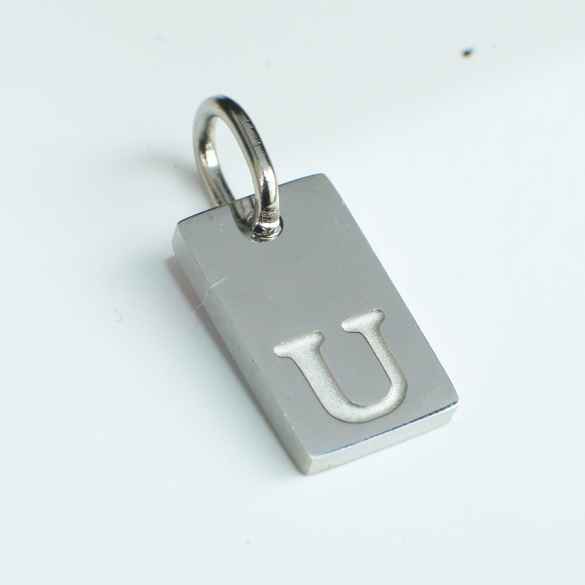 Dainty Alphabet Charm Silver - U - Stainless Steel charm by Nashira