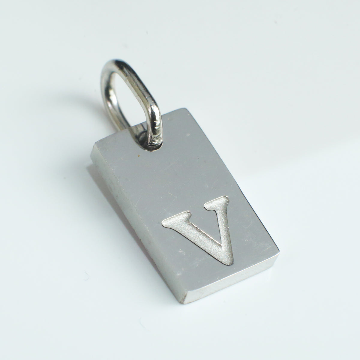 Dainty Alphabet Charm Silver - V - Stainless Steel charm by Nashira