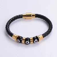 Gold Evil Eye Leather Bracelet for Men bracelet by Nashira, shown close up