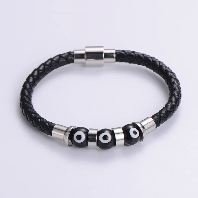 Silver Evil Eye Leather Bracelet for Men bracelet by Nashira, shown close up