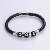 Silver Evil Eye Leather Bracelet for Men bracelet by Nashira, shown close up