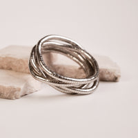 Bendable Snake Necklace - Silver necklace by Nashira, shown close up