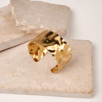 Hammered Cuff bracelet by Nashira, shown close up
