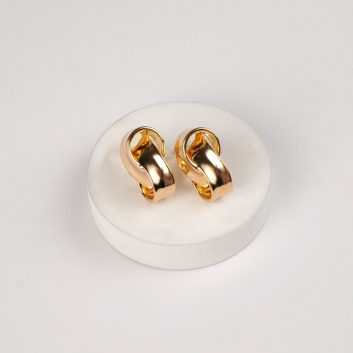 Monday Hoops earrings by Nashira, shown close up