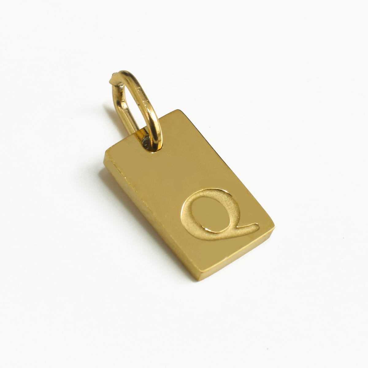 Dainty Alphabet Charm Gold  - Q charm by Nashira, shown close up
