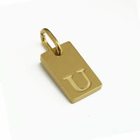 Dainty Alphabet Charm Gold  - U charm by Nashira, shown close up
