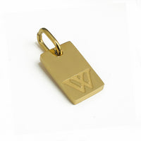 Dainty Alphabet Charm Gold  - W charm by Nashira, shown close up