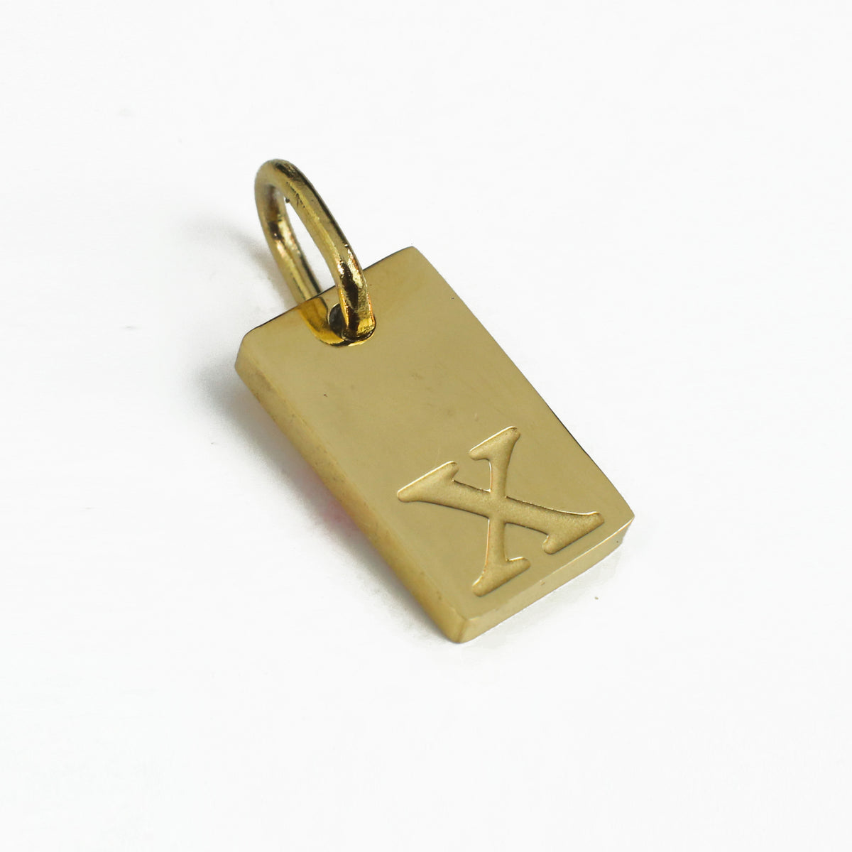 Dainty Alphabet Charm Gold  - X charm by Nashira, shown close up