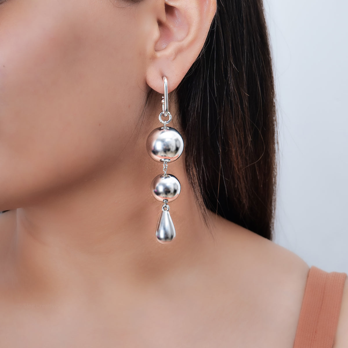 Showstopper Danglers by Nashira, stainless steel earrings