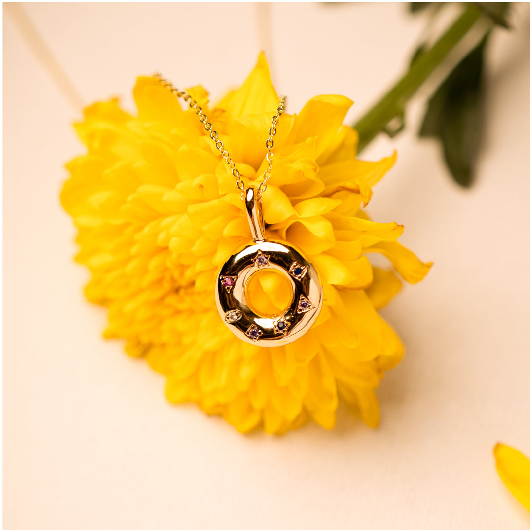 Circle of Life Pendant with Chain necklace by Nashira, shown close up